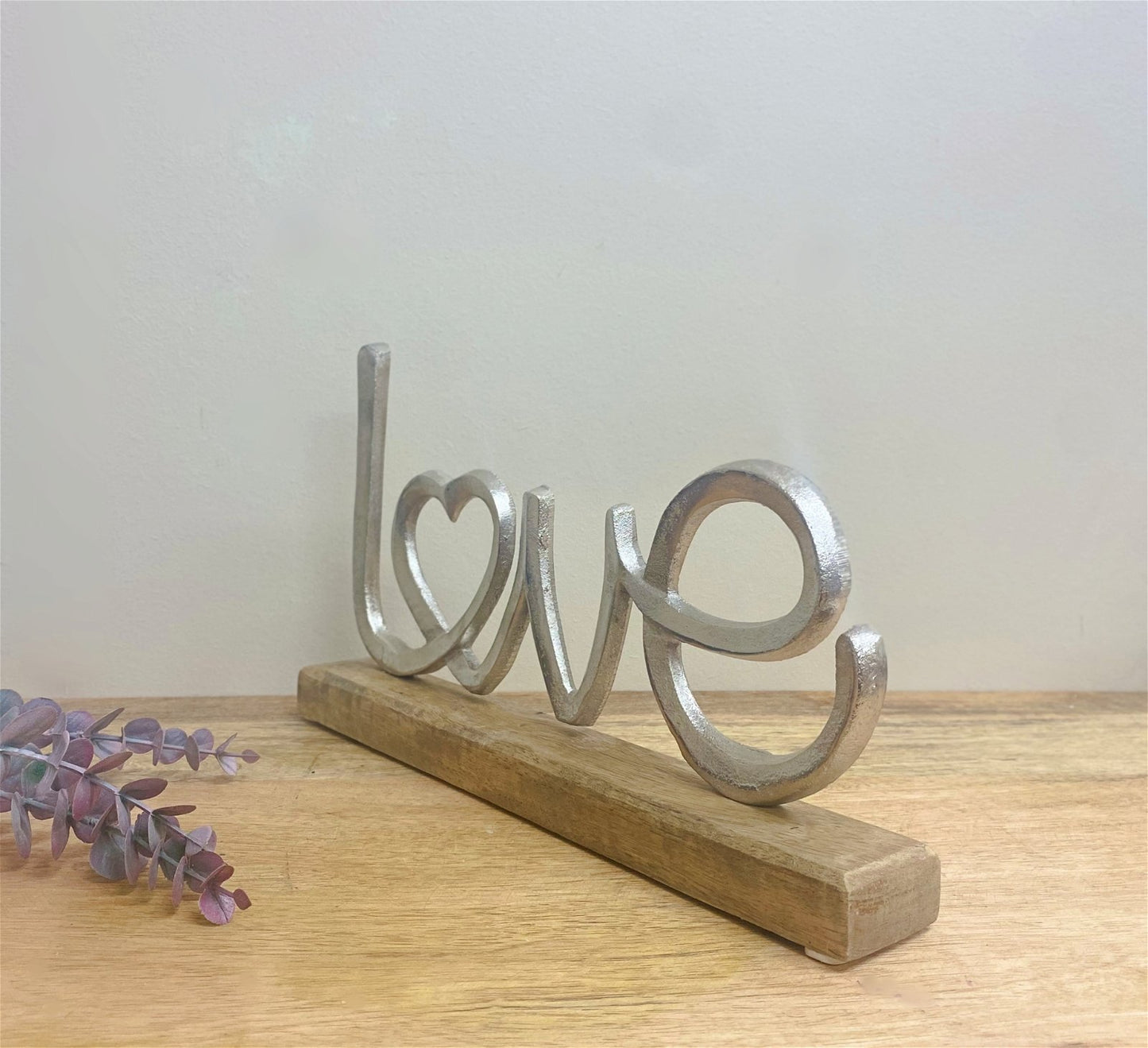 Metal Silver Love Ornament On A Wooden Base